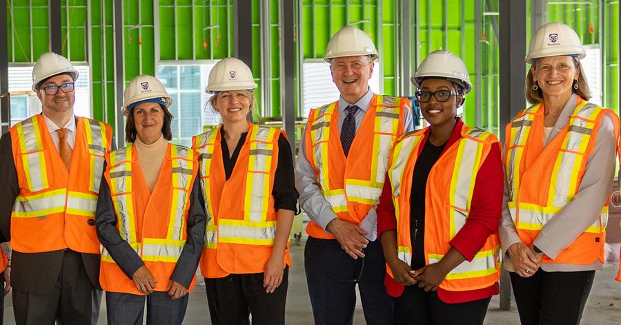 Staff touring a construction site